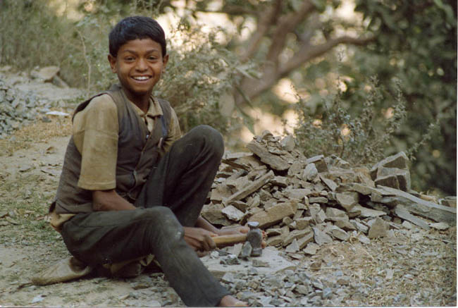 Very young road worker in Nepal